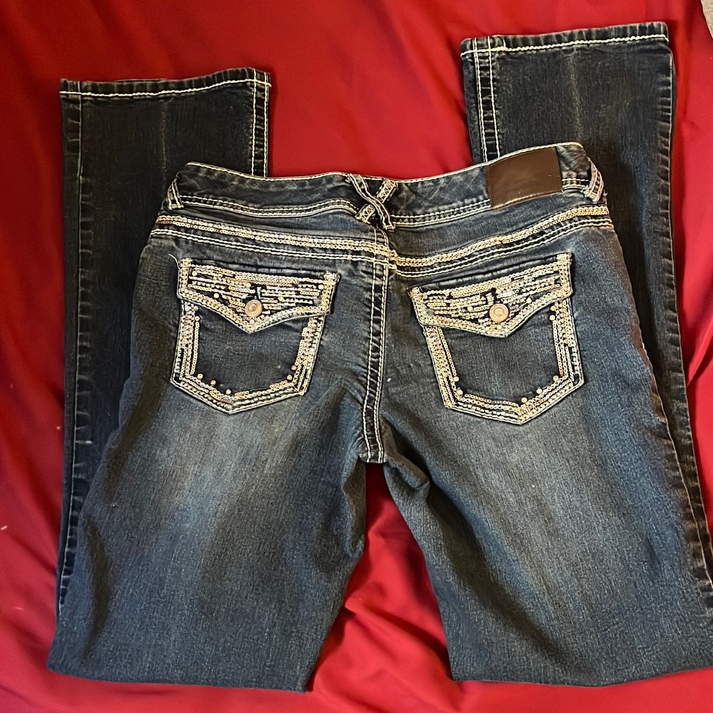 Maurice’s lightly worn jeans
